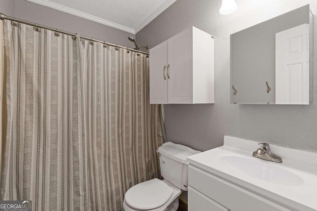 bathroom with ornamental molding, a shower with curtain, a textured ceiling, vanity, and toilet