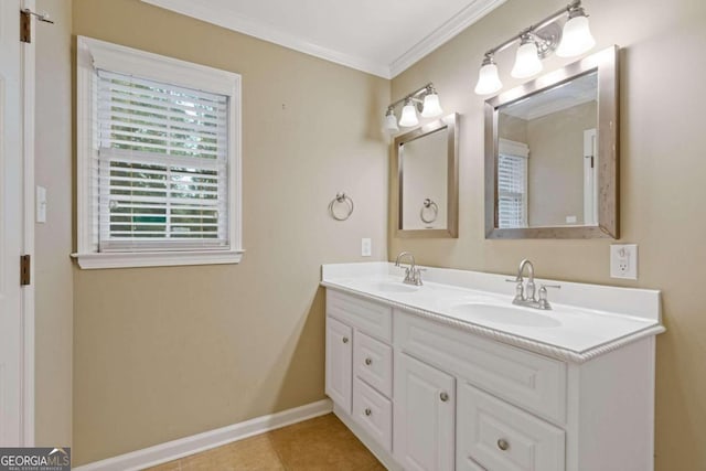 bathroom with ornamental molding, vanity, and tile patterned floors