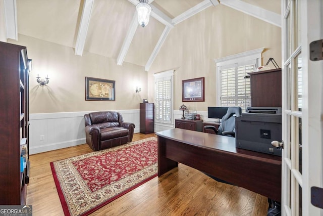 office area featuring beamed ceiling, high vaulted ceiling, french doors, and wood-type flooring