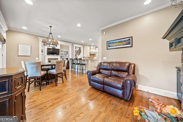 bedroom with a tray ceiling, carpet flooring, ceiling fan, and crown molding