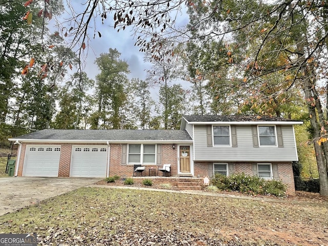 split level home featuring a garage