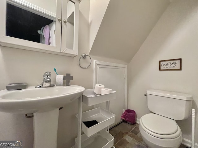 bathroom featuring toilet