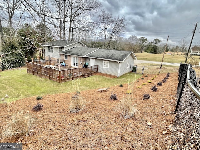 view of yard with a wooden deck