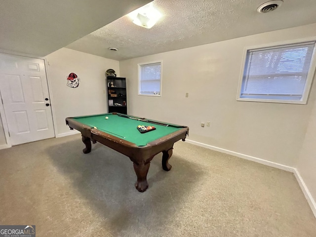 game room featuring carpet flooring, a textured ceiling, and pool table