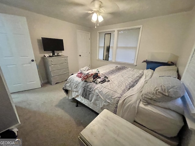 bedroom with carpet and ceiling fan