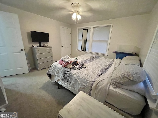 bedroom featuring carpet flooring and ceiling fan