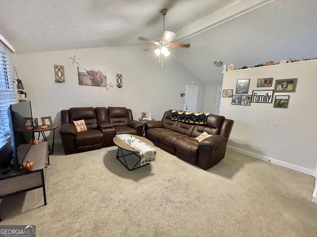 carpeted living room featuring lofted ceiling with beams and ceiling fan