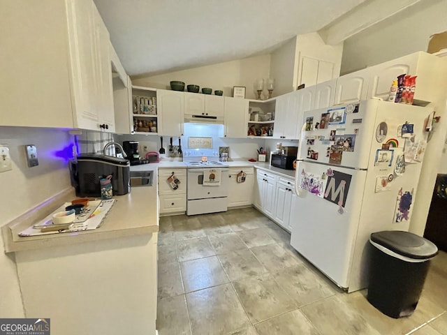 kitchen with white appliances, white cabinetry, and vaulted ceiling