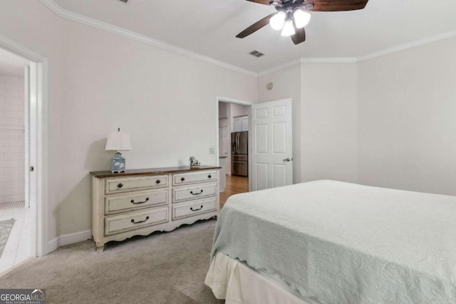 bedroom featuring ornamental molding, light colored carpet, and ceiling fan