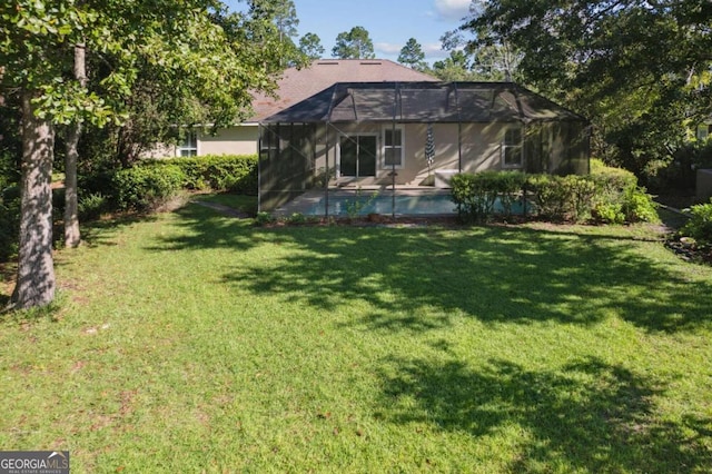 view of yard featuring a lanai