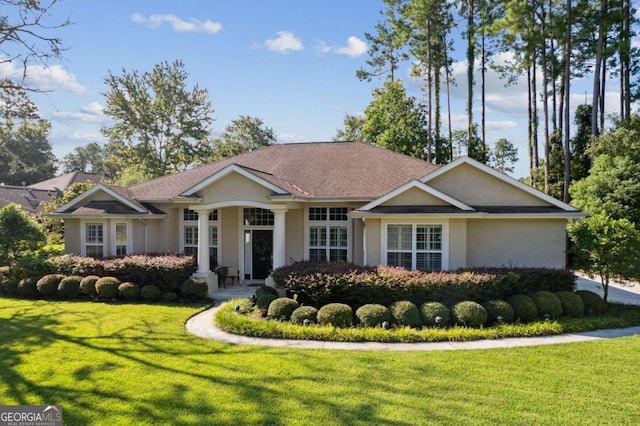 view of front facade with a front yard