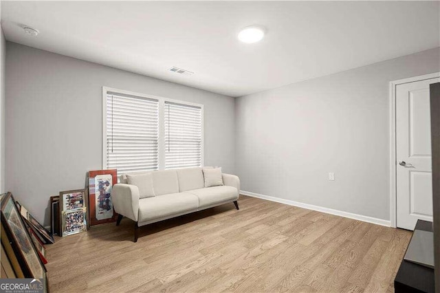 living area featuring light hardwood / wood-style flooring