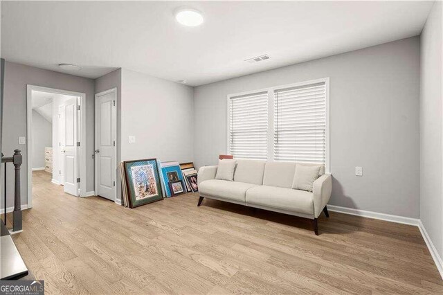 living room featuring light wood-type flooring