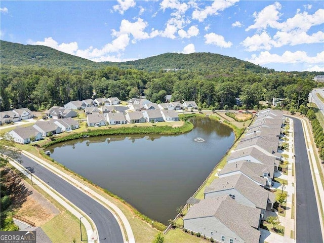 aerial view with a water and mountain view