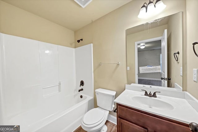 full bathroom featuring toilet, shower / bathing tub combination, and vanity