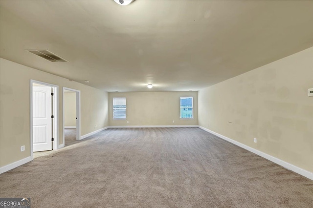 empty room featuring carpet floors