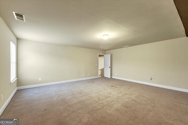 unfurnished room with carpet floors