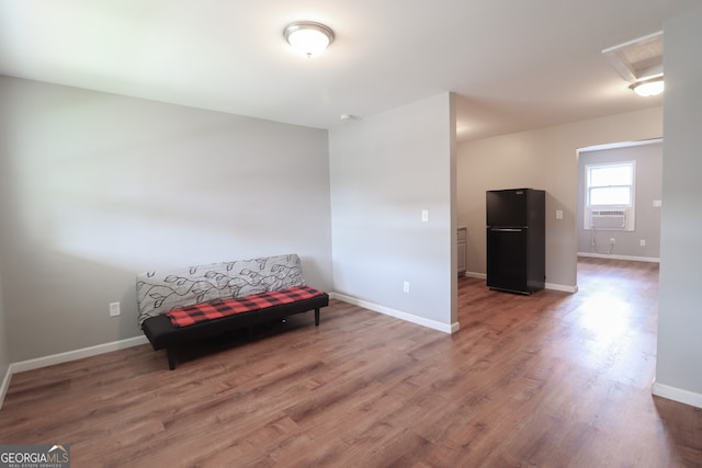 living area featuring wood-type flooring