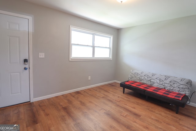 sitting room with light hardwood / wood-style floors