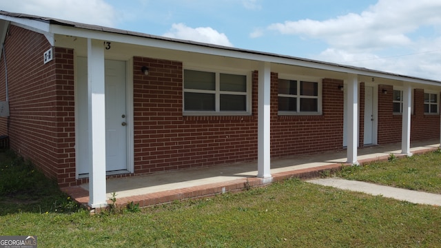 exterior space with a lawn