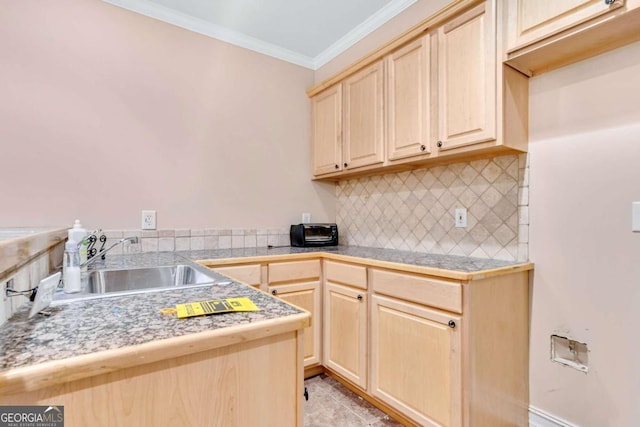 kitchen with light tile patterned flooring, sink, ornamental molding, light brown cabinets, and backsplash