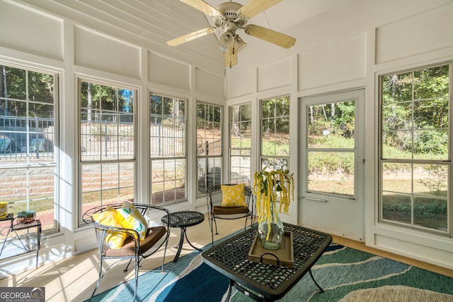 sunroom / solarium with ceiling fan