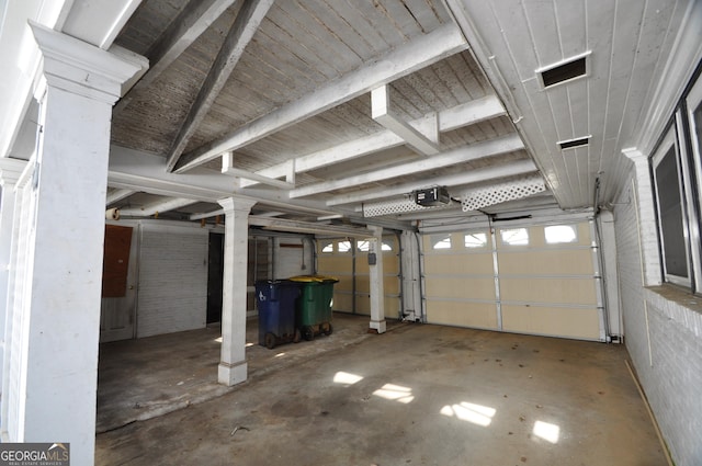 garage featuring a garage door opener