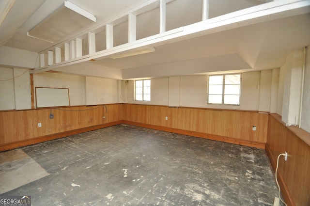 empty room with wood walls