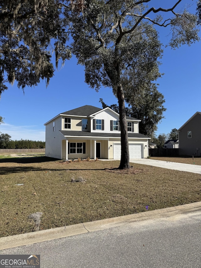 view of front of property with a garage