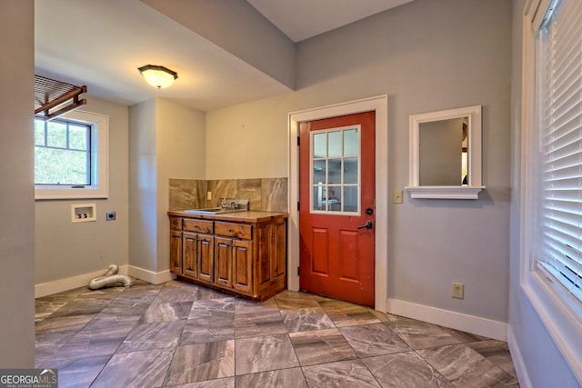 doorway to outside with sink