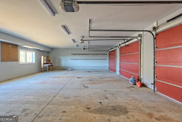 garage featuring a garage door opener