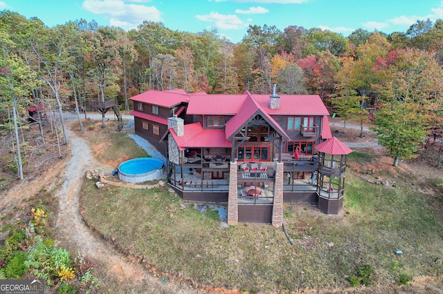 exterior space featuring a wooden deck