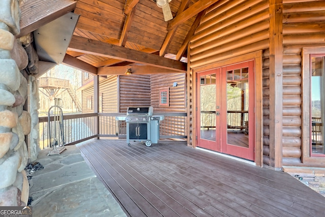 deck featuring french doors and area for grilling