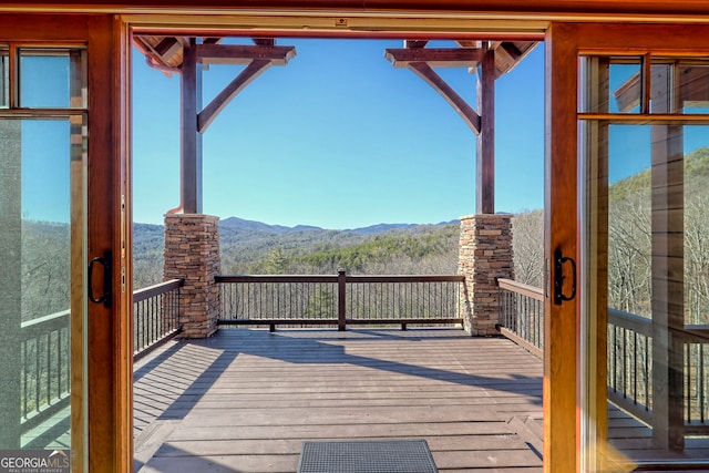 deck with a mountain view