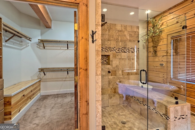 bathroom with independent shower and bath and wooden walls