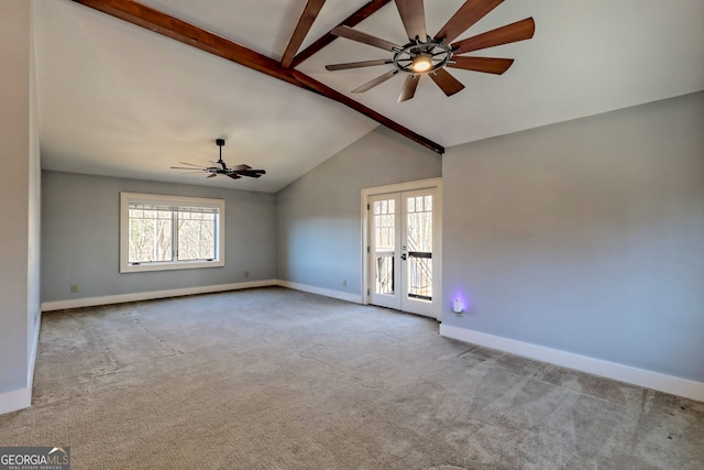 unfurnished room featuring lofted ceiling with beams, french doors, light carpet, and ceiling fan