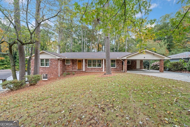 ranch-style home with a front lawn and a carport