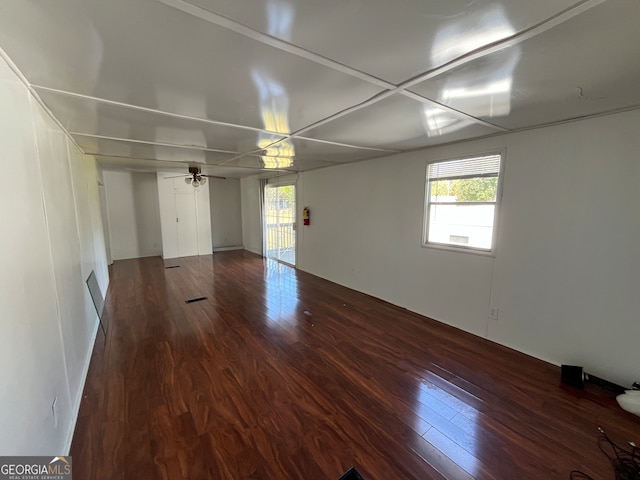 spare room featuring hardwood / wood-style flooring and ceiling fan