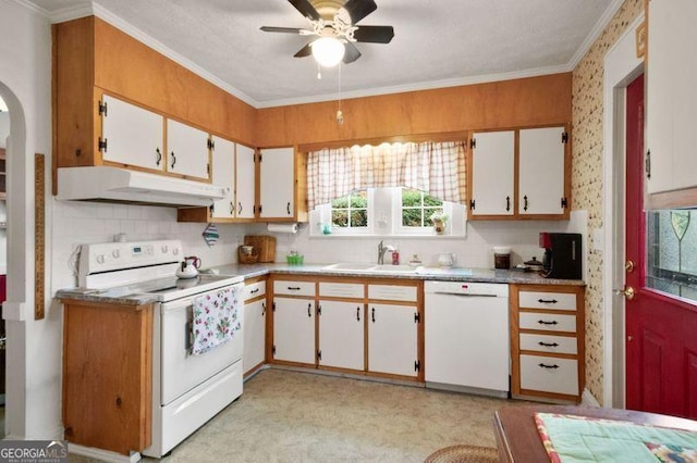 kitchen featuring white cabinets, sink, white appliances, and crown molding