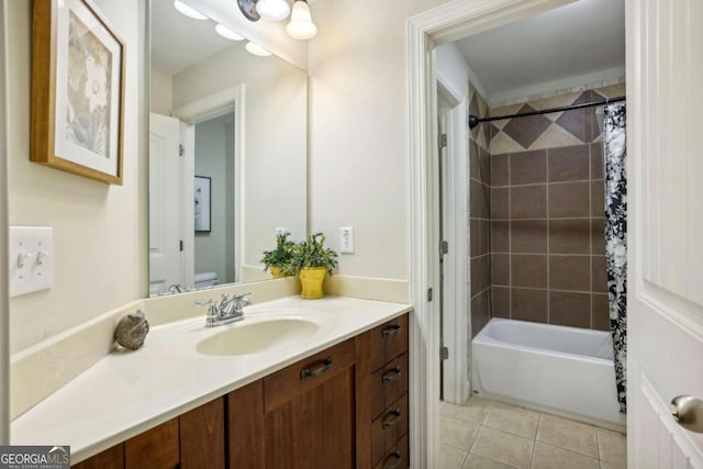 full bathroom featuring vanity, tile patterned flooring, toilet, and shower / bath combination with curtain