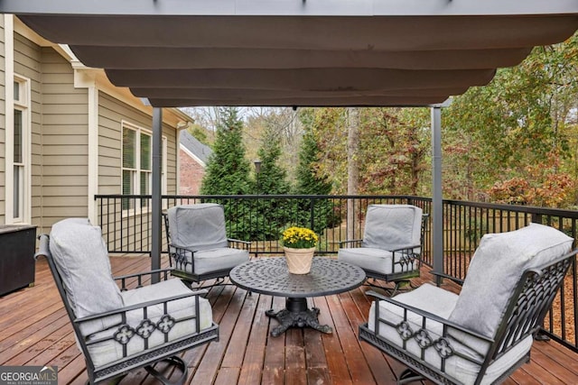 wooden deck featuring outdoor lounge area