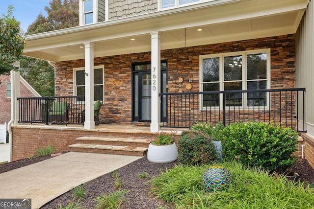 entrance to property with a porch