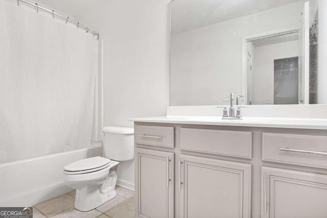 full bathroom featuring vanity, shower / bath combo, tile patterned floors, and toilet