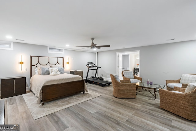 bedroom featuring ceiling fan and light hardwood / wood-style flooring