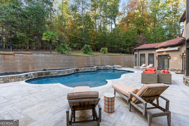 view of pool featuring a patio and an outdoor living space