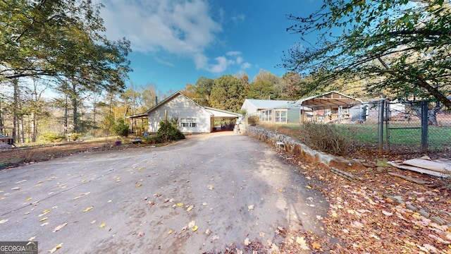 view of front facade with a carport