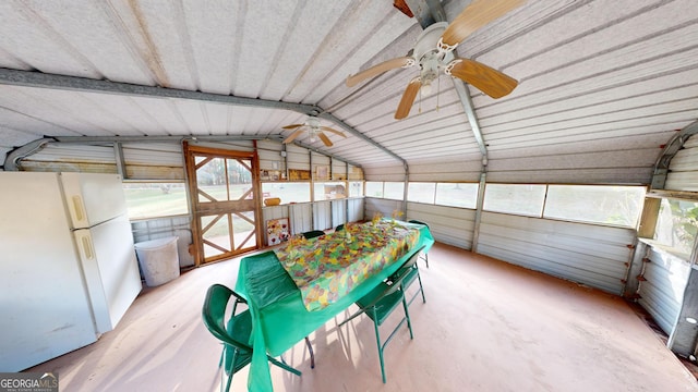 unfurnished sunroom with a healthy amount of sunlight and lofted ceiling