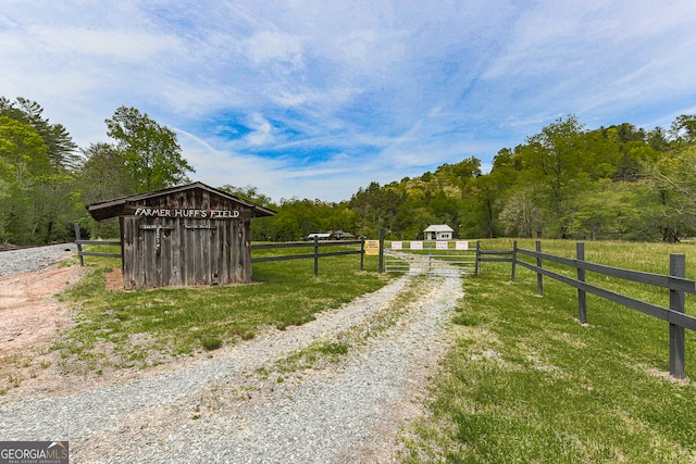 view of road with a rural view