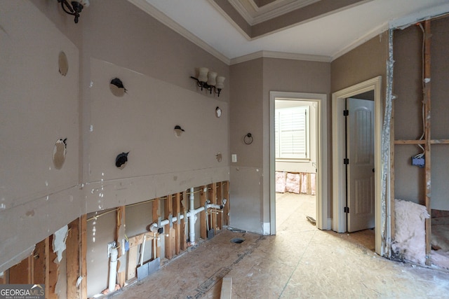 hall featuring ornamental molding