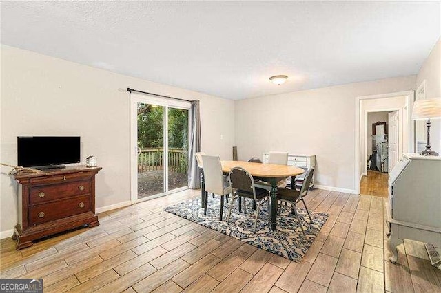 dining room with light wood-type flooring